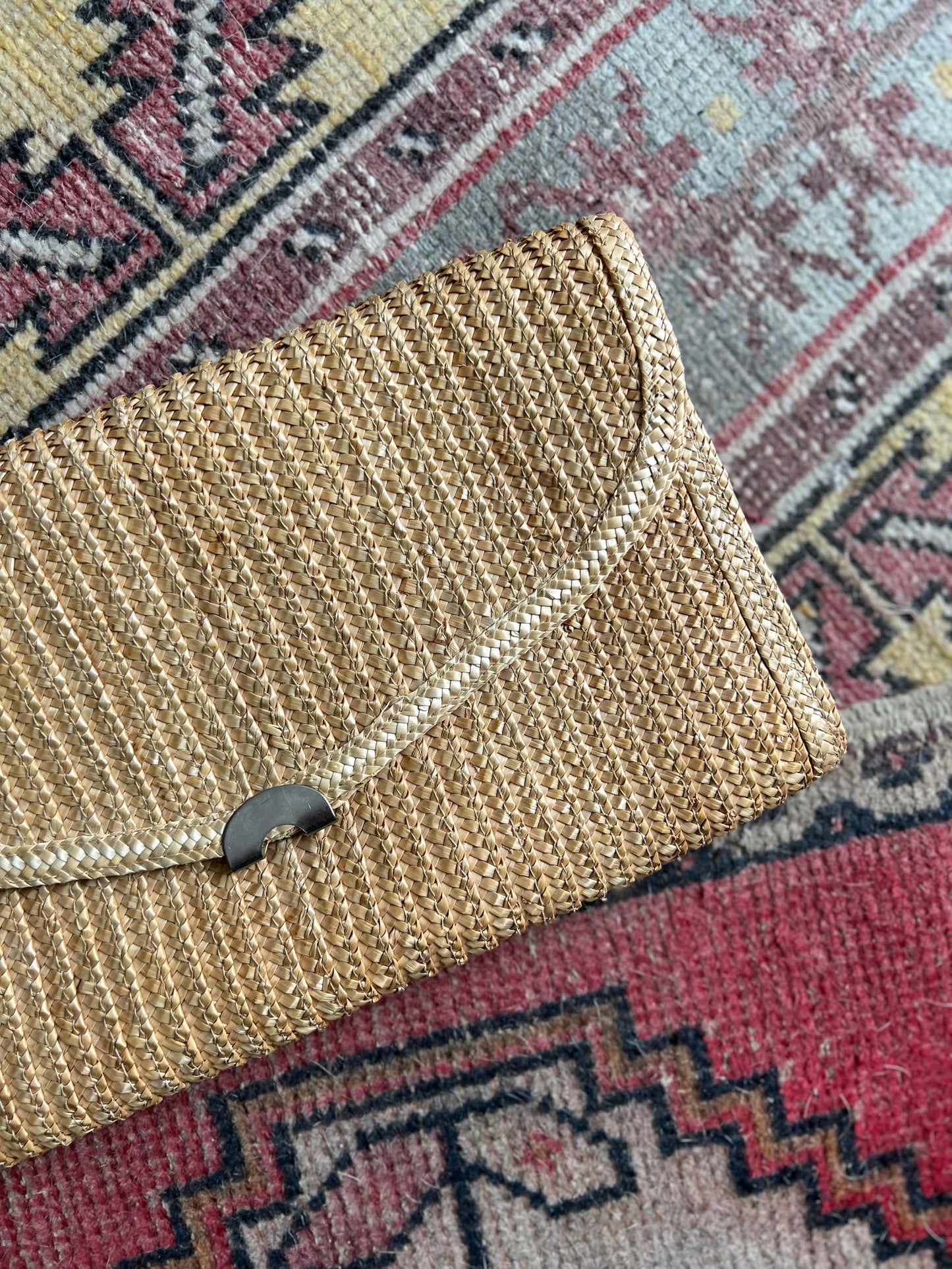 Braided straw clutch