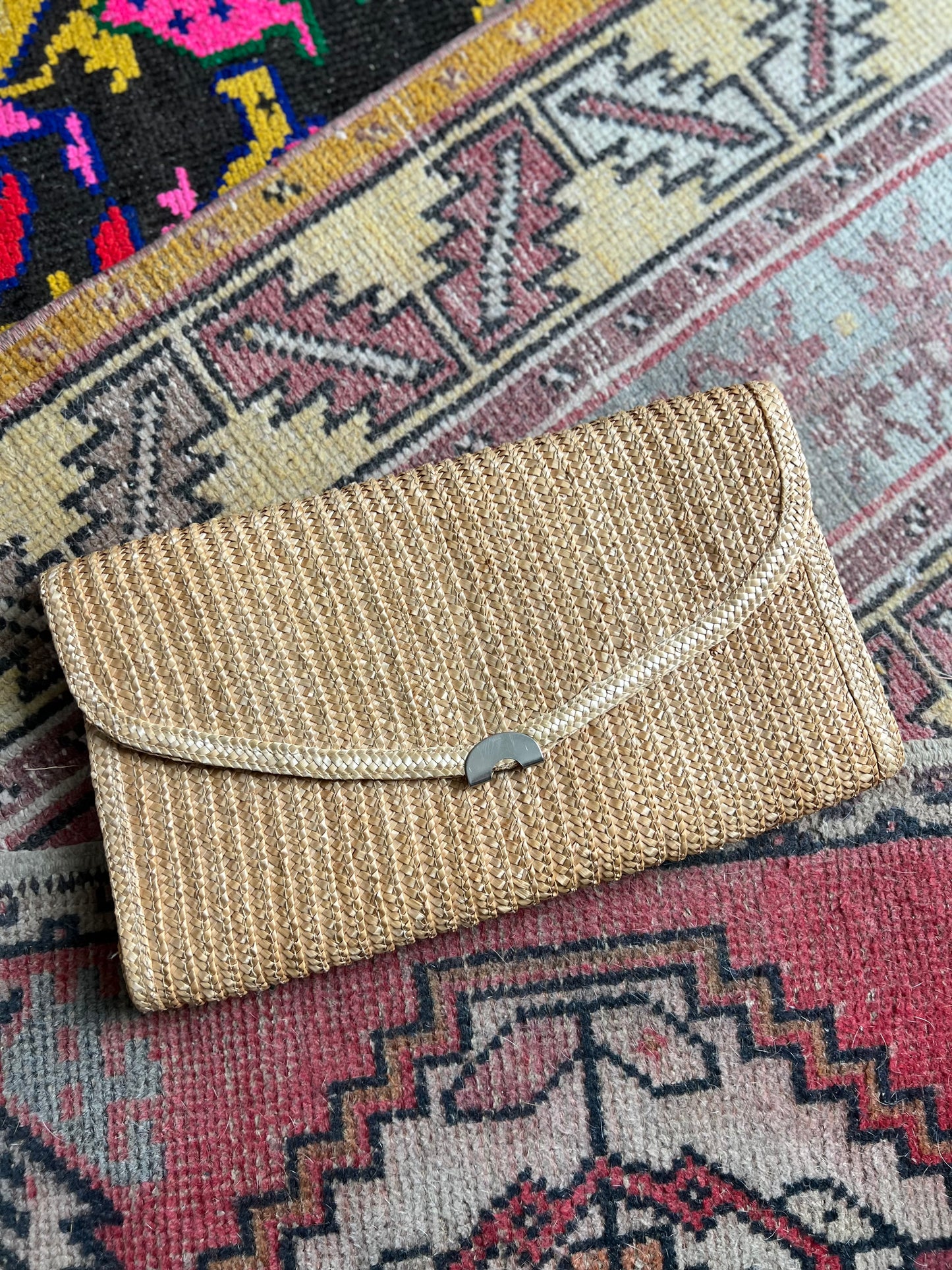 Braided straw clutch