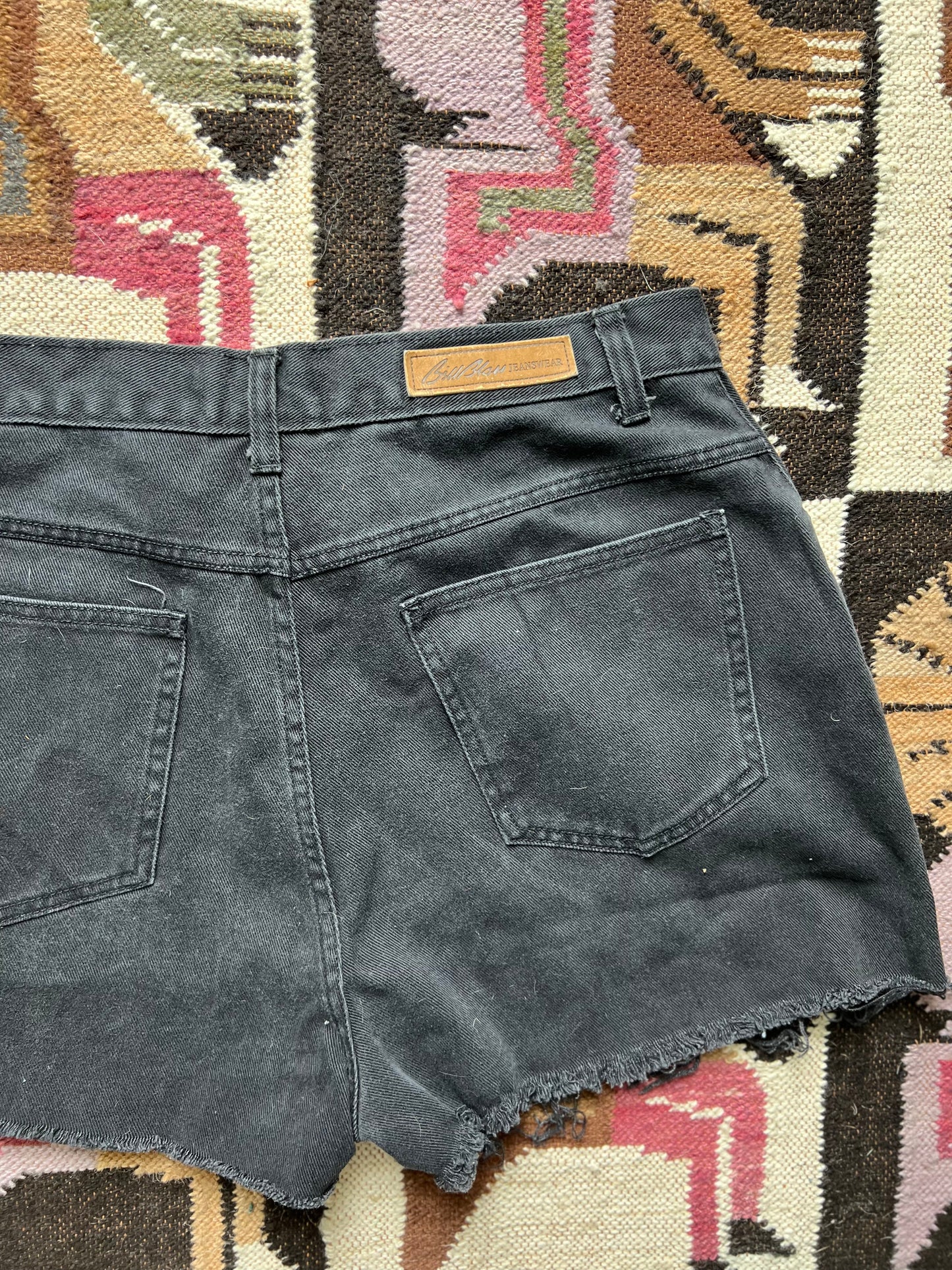 1990s Bill Blass black denim cutoffs 31”