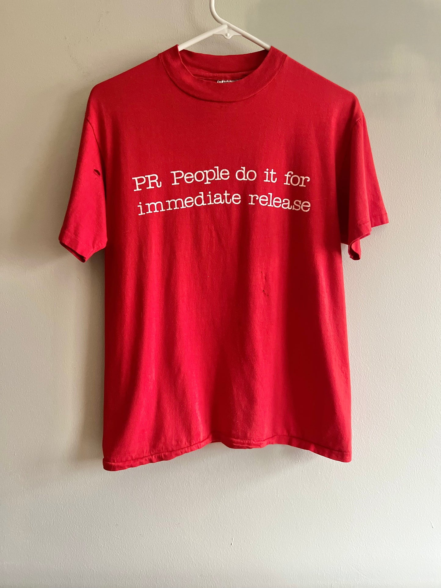 1980's 'PR People do it for immediate release' tee M